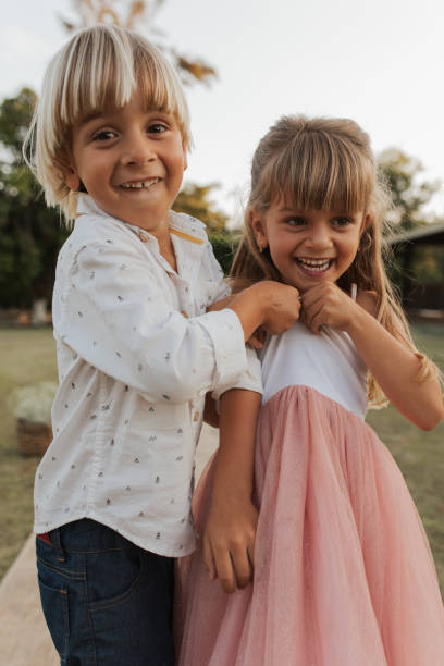 Children playing at the Wedding Brothers playing in wedding hallway outdoors casamento stock pictures, royalty-free photos & images