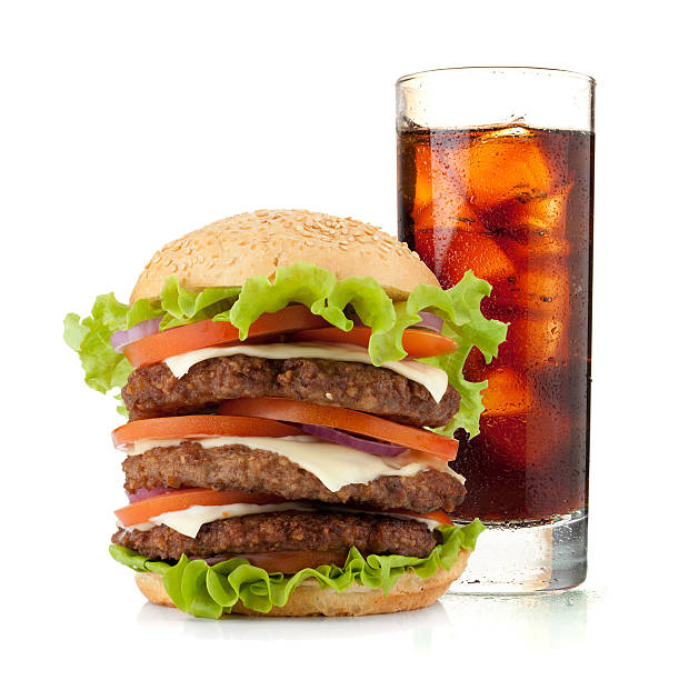 istock Glass of cola with ice and hamburger 136701062