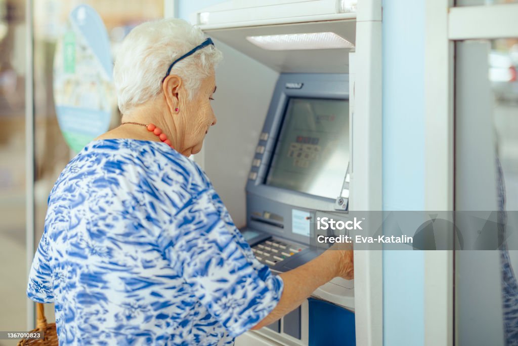 Using the ATM ATM Stock Photo