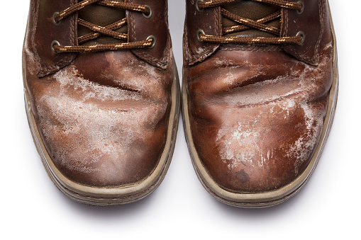 Men's shoes damaged by salt in winter