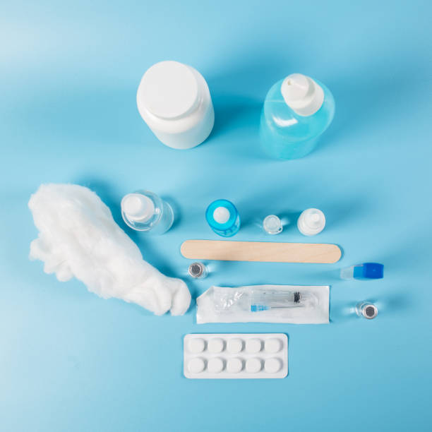 istock Medical set on a blue background. Drops and pills. 1367015311