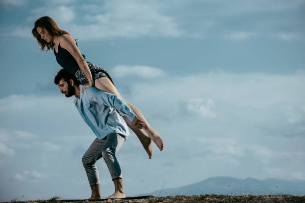 istock Active happy adults dancing together in dance class in nature 1367015486