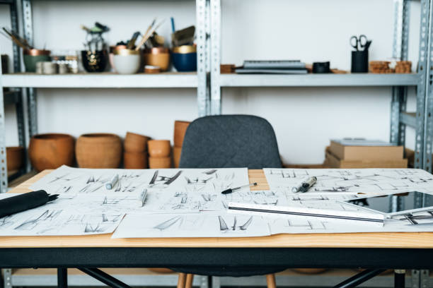 istock Working Place of Architect with Blueprints and Digital Tablet on the Table 1367015528