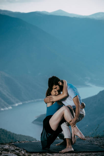 istock Handsome b-boy dancing with a slim, attractive girl 1367015694