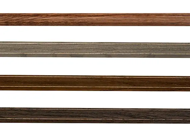 Rustic wood assortment for edges, borders, and outlines, white isolated design elements, narrow picture frame moulding.