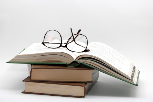 Glasses and books concept of study