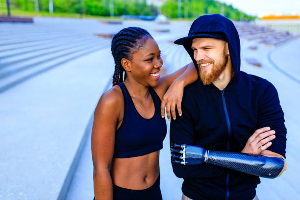 mixed race friends fitness training together outdoors summer morning mixed race friends fitness training together outdoors summer morning . paralympic games stock pictures, royalty-free photos & images