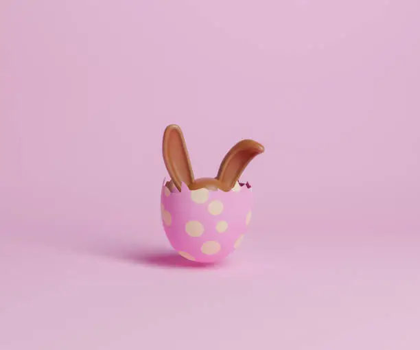 broken easter egg with chocolate bunny ears peeking out. 3d rendering