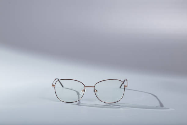 istock Reading glasses close up, on gray background. Frame and lenses for reading. 1367021407