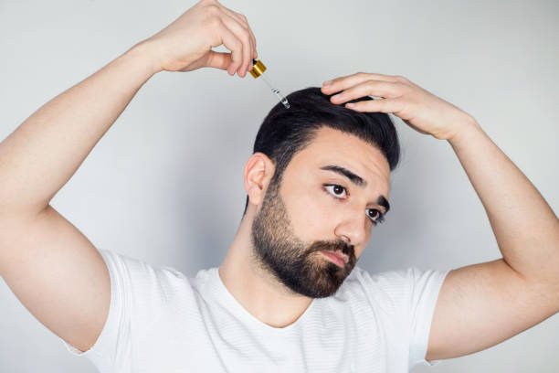 530 Hair Oil Men Stock Photos, Pictures & Royalty-Free Images - iStock