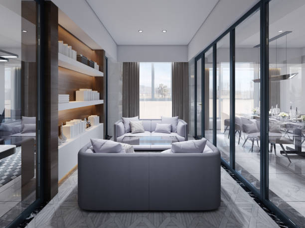 istock Glazed meeting room and library with two sofas and a magazine table with marble and wood floors. 1367021533