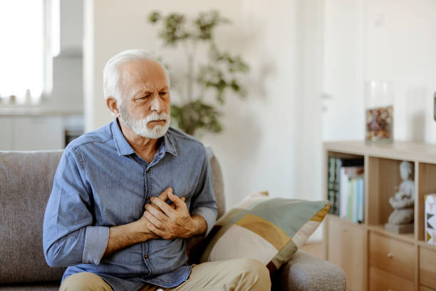 Man With Heart Attack Senior man with chest pain suffering from heart attack chest pain stock pictures, royalty-free photos & images