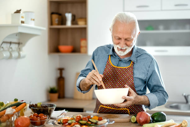 istock Cheerful Senior Man in the Kitchen 1367022524