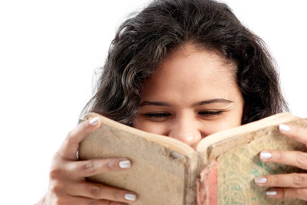 istock Indian happily  girl reading book 136702337