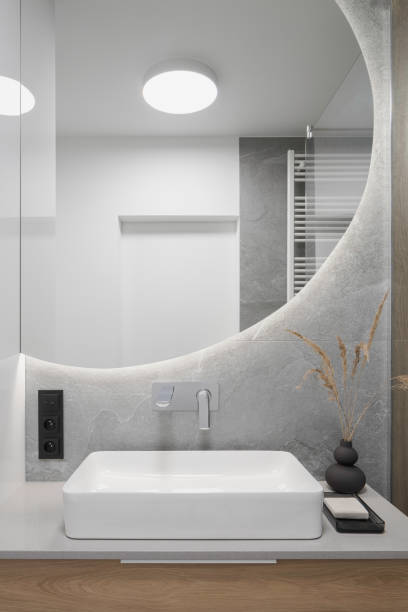 istock Big, round mirror in bathroom 1367023957