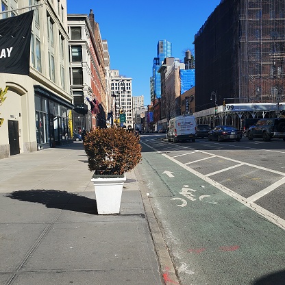 Photo of a bare sidewalk in downtown Manhattan, New York.