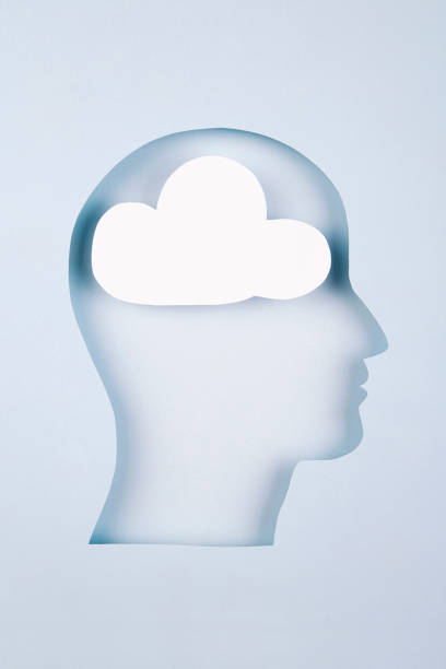 istock Human head in paper cut style with cloud 1367025536