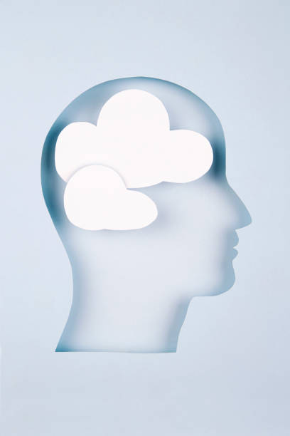 istock Human head in paper cut style with cloud 1367025660