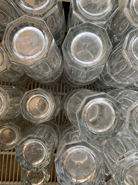 istock Stacks of glasses closeup view with selective focus on foreground 1367025828
