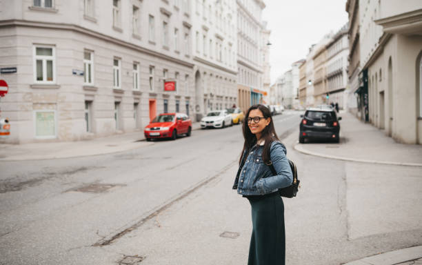 istock Woman walks down the street 1367025980
