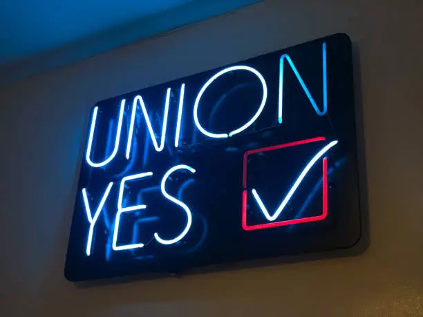 A neon Union Yes sign.
