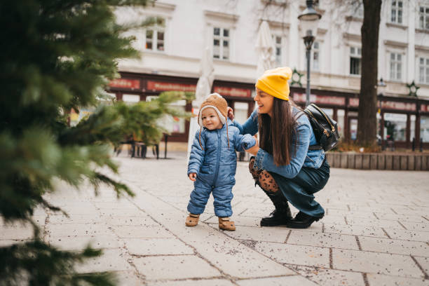 istock Mom and Baby first steps outside 1367028558
