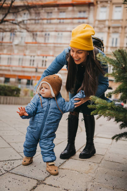 istock Mom and Baby first steps outside 1367028770