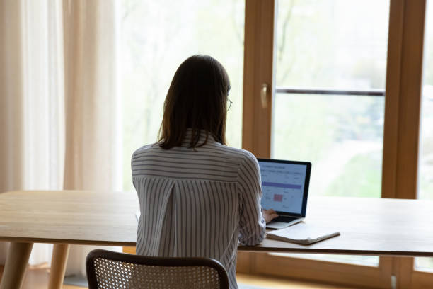istock Business woman working at home office workplace table 1367031442