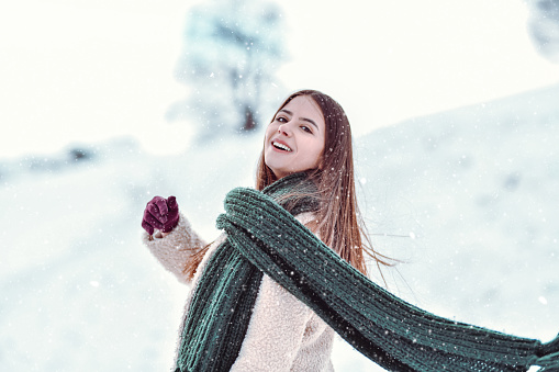 Beautiful Female Throwing Snow Shawl And Enjoying Mountain Snow