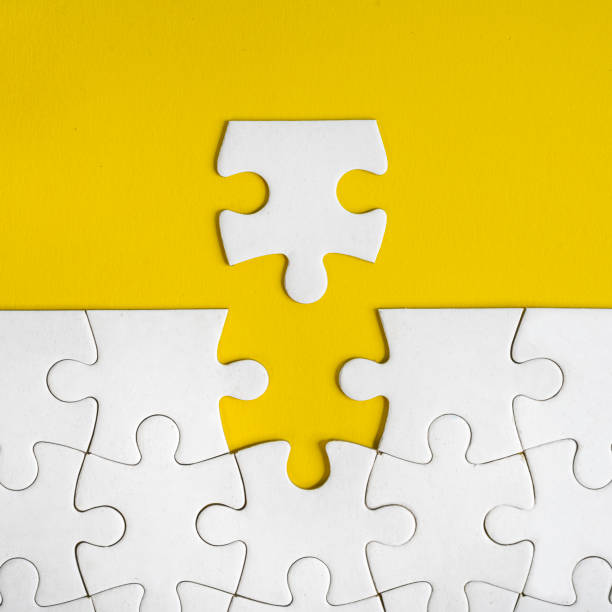 istock piece of the puzzle to connect 1367034742