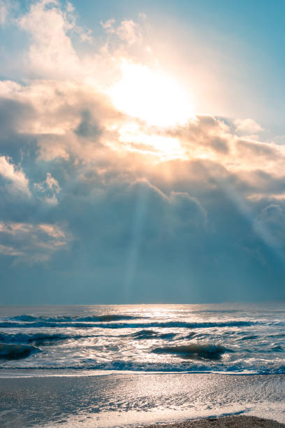 istock Marine vertical landscape. Sea with waves and beautiful cloudy sky 1367036163