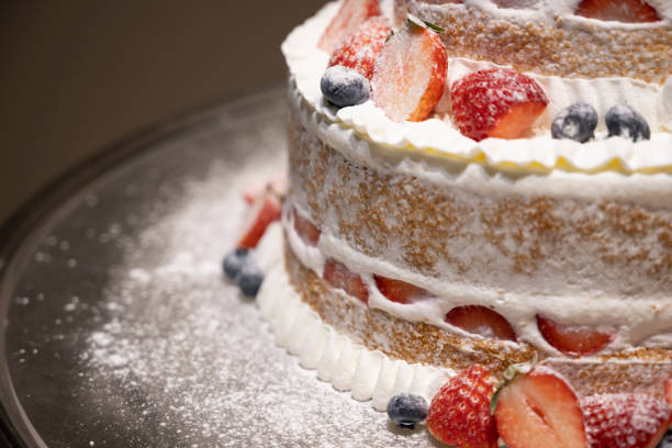 This is one act taken at a wedding reception.The cake looks delicious ,,,