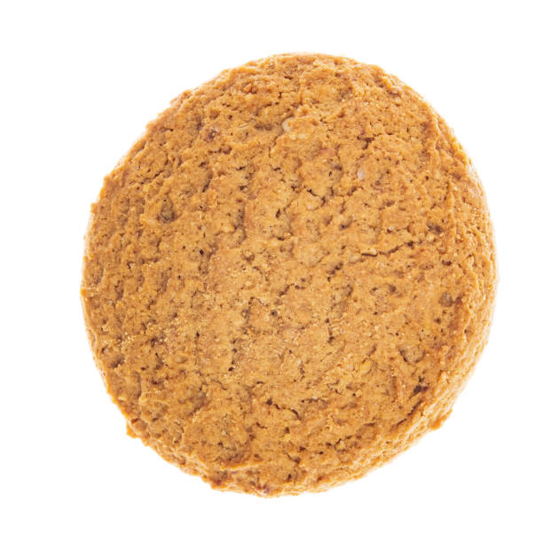 istock Oatmeal cookies close up top view isolated on white background 1367040678