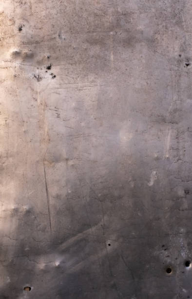 istock Old scratched grungy silver grey metal tin background. 1367042876
