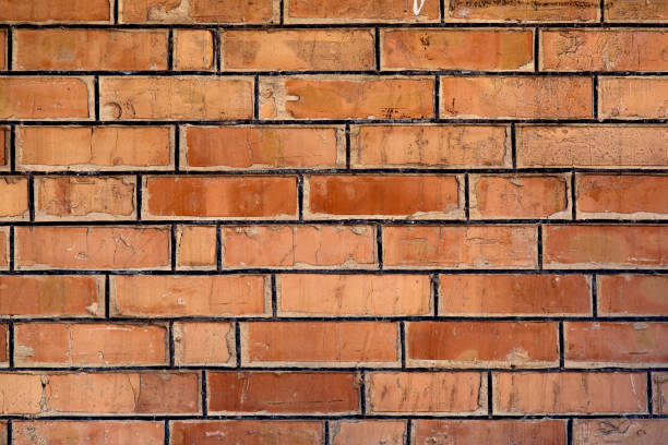 istock brick wall texture stone facade of old building exterior surface. 1367045425