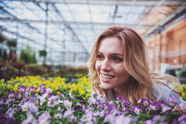 istock Woman in orangery 1367045840