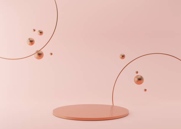 istock Podium with copper rings and flying, glossy metallic 3D spheres on pink background. Elegant podium for product, cosmetic presentation. Mock up. Pedestal or platform for beauty products. 3D rendering. 1367047331