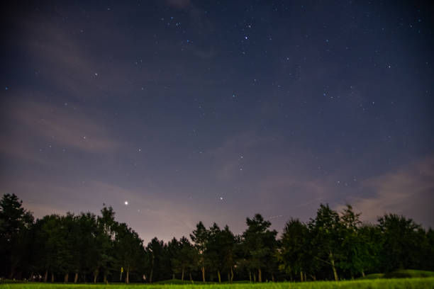 istock Dark night sky with visible stars. 1367050572