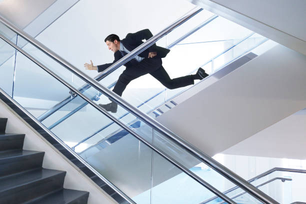 istock Businessman Dashing Downstairs 1367054144