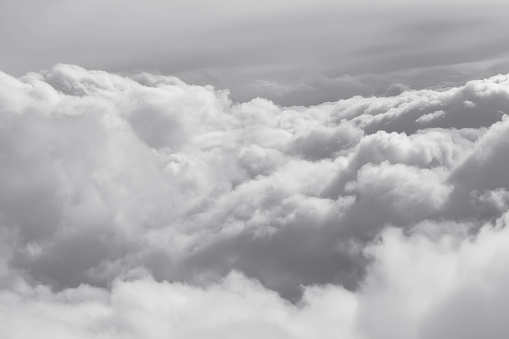 Grey clouds background . Flying in the clouds . Awesome cloudscape