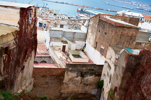 A view from the Casbah of Algiers to the harbour and port district in the background. Casbah is a UNESCO world heritage site, but sadly much of it is in decline and crumbling due to lack of care and no maintenance