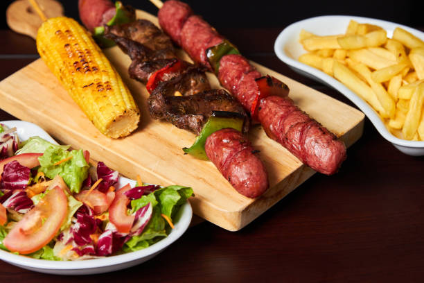 istock beef and chorizo brochettes with roasted corn and salad 1367056136