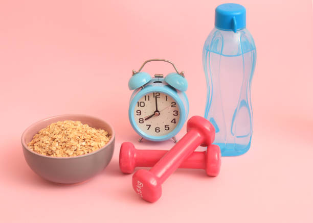 istock Blood glucose meter and diabetic food on pink backround. 1367056816