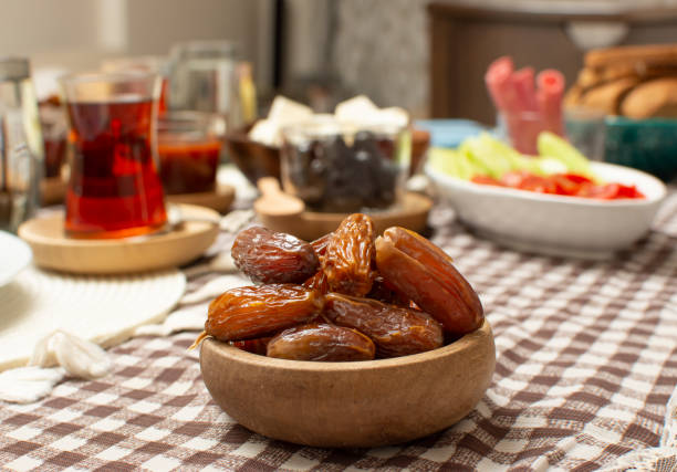 istock Middle Eastern traditional breakfast during Ramadan fasting (aka: Sahur or Suhoor). Date fruit for dinner or iftar.  Ramadan background. Ramadan kareem. 1367058479