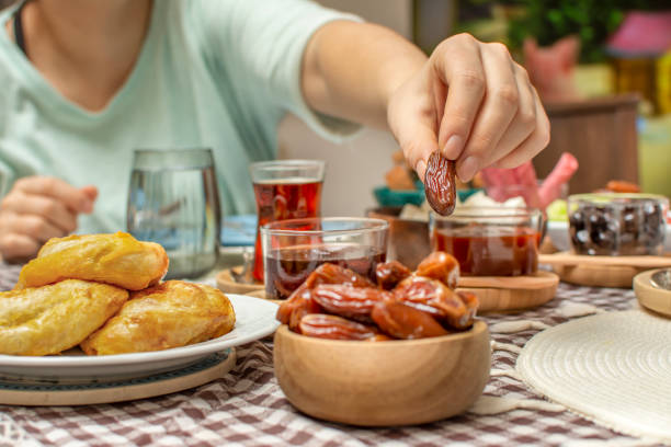 istock Middle Eastern traditional breakfast during Ramadan fasting (aka: Sahur or Suhoor). Date fruit for dinner or iftar.  Ramadan background. Ramadan kareem. 1367058552
