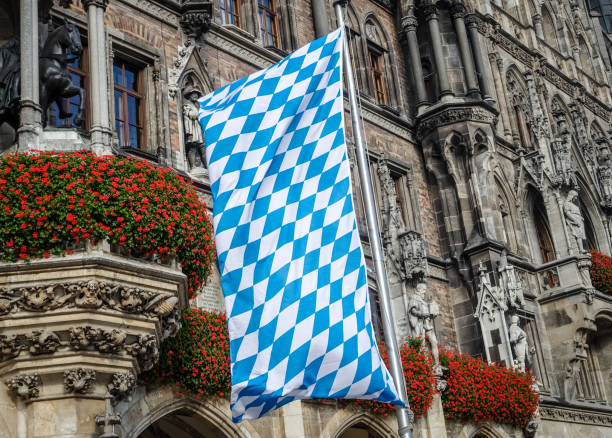 Bavarian flag Close-up image of the Bavarian flag in front of Rathaus in Munich, Germany bavarian flag stock pictures, royalty-free photos & images