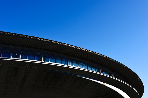 Tokyo, Japan - January 16, 2022 : view of theTokyo Metropolitan Gymnasium Tokyo, Japan. \nThis Tokyo Metropolitan Gymnasium was completed in 1990.\nThere are about 5,178 seats on the 2nd and 3rd floors combined, and you can take the elevator to the 2nd floor.\nUsed for various indoor sports.