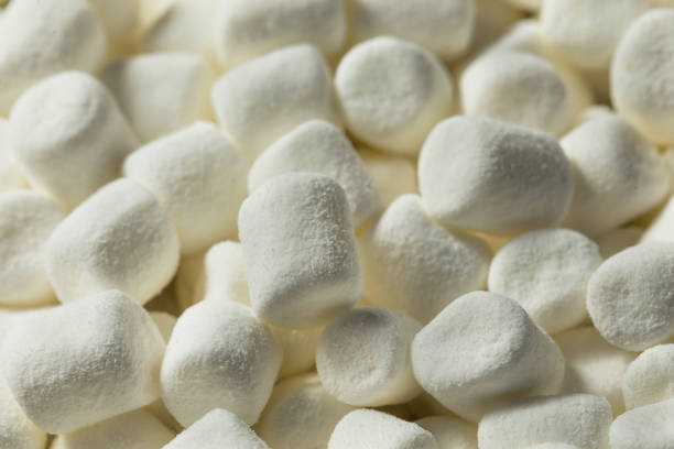 istock Unhealthy Sugary White Mini Marshmallows 1367062988