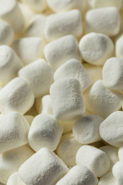 istock Unhealthy Sugary White Mini Marshmallows 1367062991