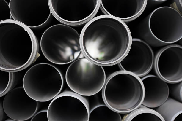 istock PVC water pipe in storage . Background of plastic pipes 1367063471